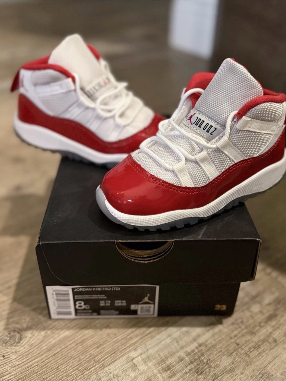 Jordan 11 Kids Red and White Retro Sneakers